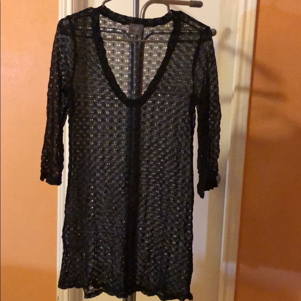 Idear to wear over swimming suit. Like new